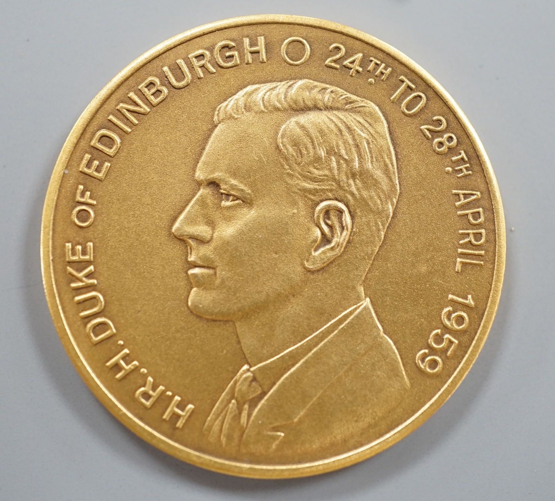 A cased 9ct gold 'H.R.H.Duke of Edinburgh 24th-28th April 1959' medallion, 18.6 grams.